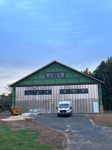 Progress — Custom Aircraft Hangar Exterior — Multi-System Cladding, Custom aircraft hangar